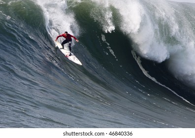 HALF MOON BAY, CA - FEBRUARY 13: Anthony Tashnick takes a spill in the 2009/2010 Mavericks Surf Contest February 13, 2010 in Half Moon Bay, California.