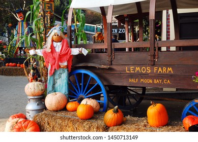 Half Moon Bay, CA USA October 25 Pumpkins and whimsical scarecrows abound at a roadside farm in Half Moon Bay, California