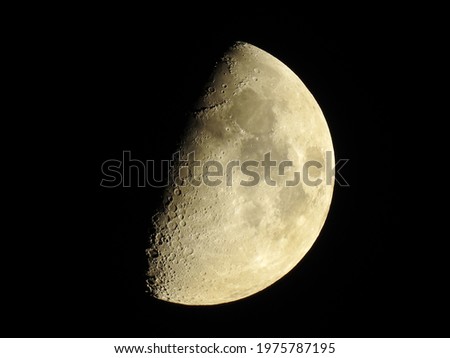 Half moon and craters; Illuminated and bright astrophotography 