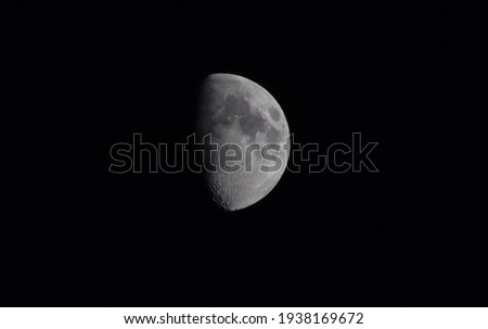 Half moon in the darkness