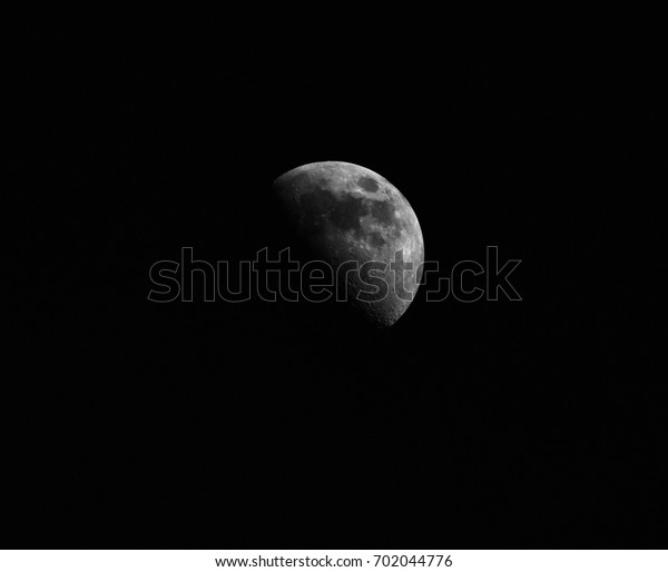 half moon in darkness for\
background