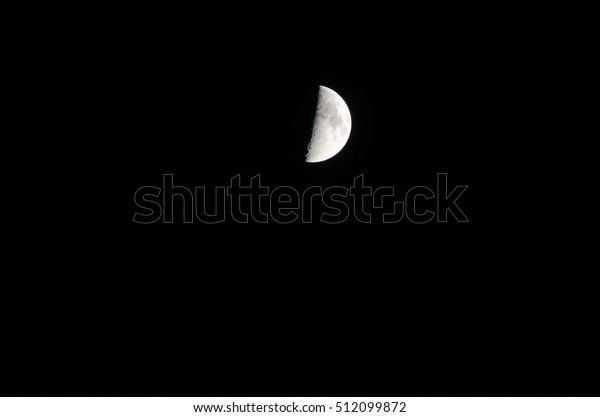 Half moon in the darkness
might.