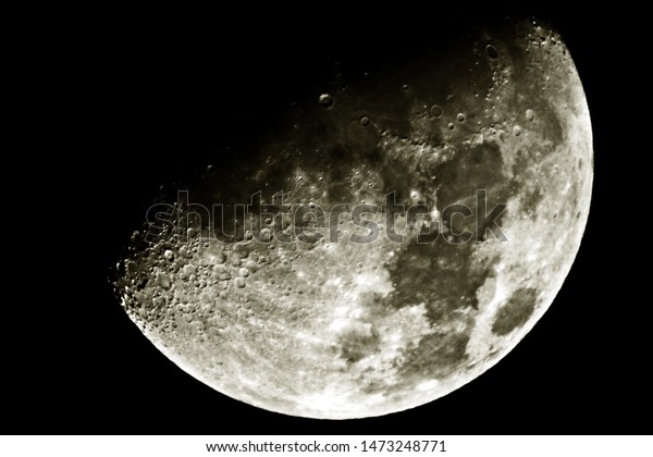 Half\
moon / Earth Moon is an astronomical body that orbits the planet\
and acts as its only permanent natural\
satellite.