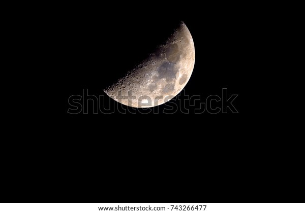 Half moon with enhanced color to show the real\
colors of terrain surface.