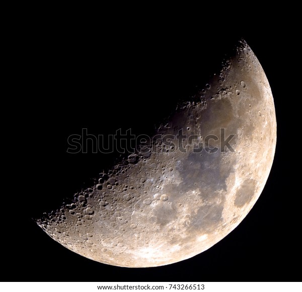 Half moon with enhanced color to show the real\
colors of terrain surface.