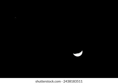 half moon and mars in the sky