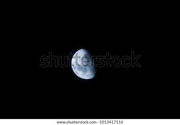 Half Moon , Quarter\
Moon Over Night Sky