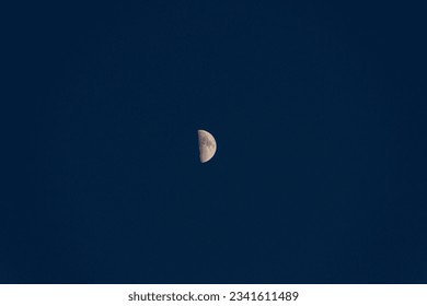 half moon in the sky