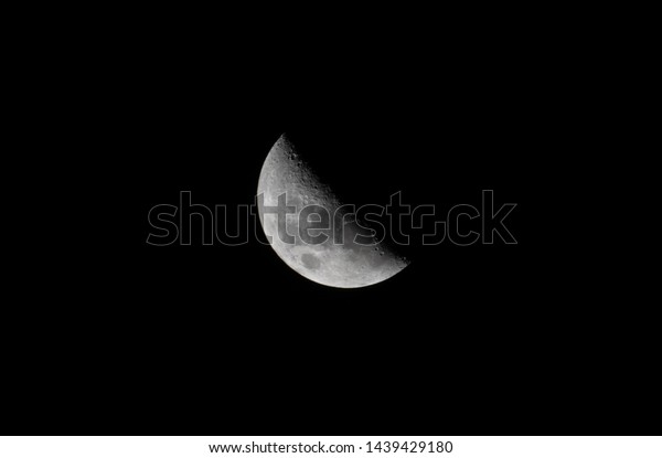 Half moon in telephoto lens\
detail