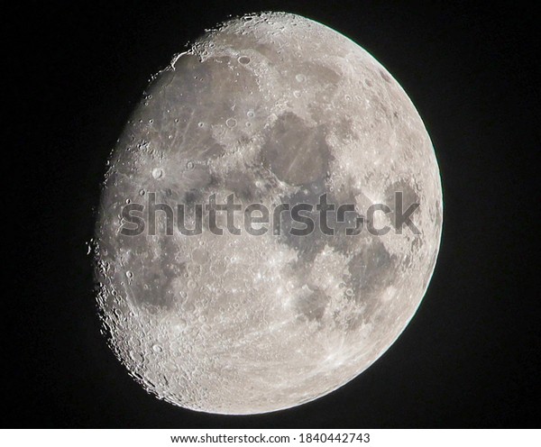 half moon view\
from earth at dark mid\
night