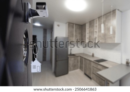 Half opened door into the modern cozy home interior