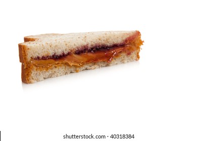 Half Of A Peanut Butter And Jelly Sandwich On A White Background