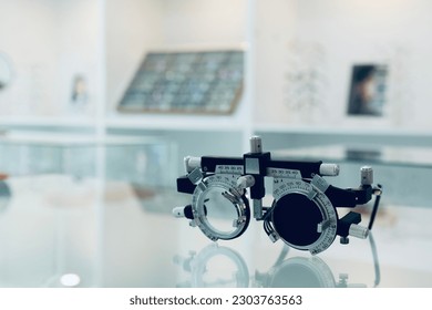 Half of prescription glasses for high myopia Eyesight measuring instrument vision care background, Trial frame, Optometrist trial frame for eye test, eye test, trial frame eyeglasses - Powered by Shutterstock