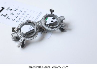 Half of prescription glasses for high myopia Eyesight measuring instrument vision care background, Trial frame, Optometrist trial frame for eye test, eye test, trial frame eyeglasses - Powered by Shutterstock