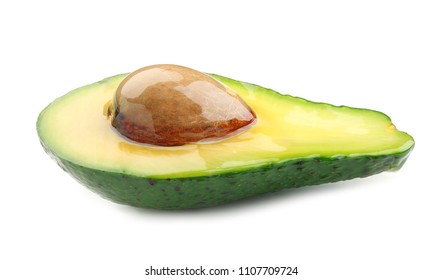 Half of ripe avocado with oil on white background - Powered by Shutterstock