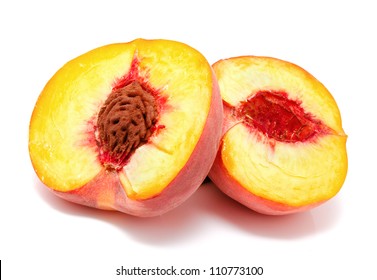 Half of ripe peach isolated on a white