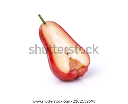 Half slice of fresh red rose apple isolated on white background. Clipping path.