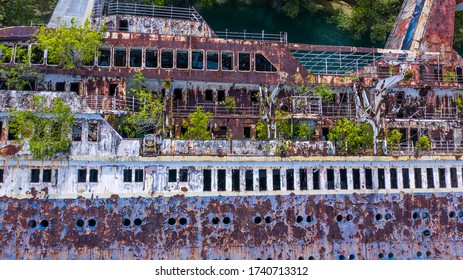 Half Sunken Ship At Roderick Bay In Solomon Island.