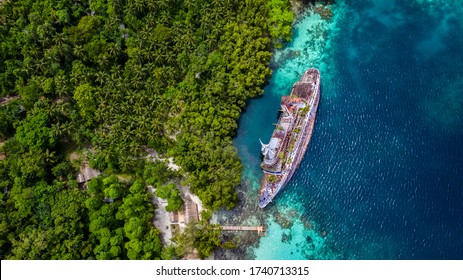 Half Sunken Ship At Roderick Bay In Solomon Island.