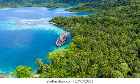 Half Sunken Ship At Roderick Bay In Solomon Island.