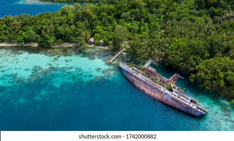 Half Sunken Ship At Roderick Bay In Solomon Islands