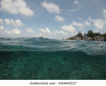 Half Underwater Shot With Water Villas