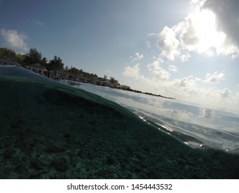 Half Underwater Shot With Water Villas