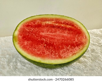 Half watermelon on the table. watermelon is highly cultivated fruit worlwide
