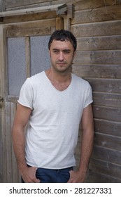 Half-length Color Portrait Of Young Man About Thirty-five Years Old, Looking Serious To The Camera