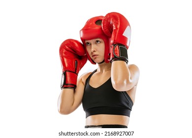 Half-length portrait of professional female boxer in sports protective equipment posing isolated on white background. Sport, competition, hobby, results, success concept. Banner, poster for ad - Powered by Shutterstock