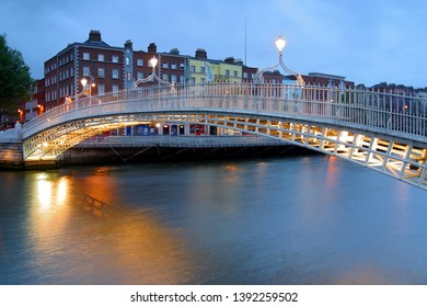 Halfpenny Bridge crossing River Liffey, Dublin, Ireland