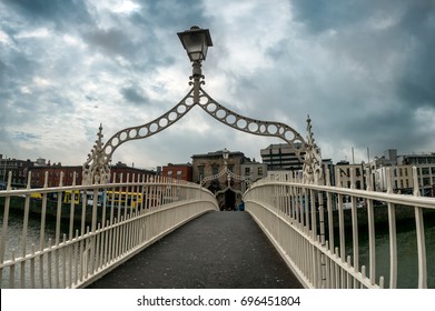 Halfpenny bridge over river Liffey in Dublin Ireland