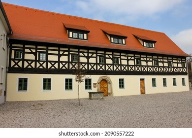 Half-timbered Facade With A Detailed Structure On A Renovated Village Inn