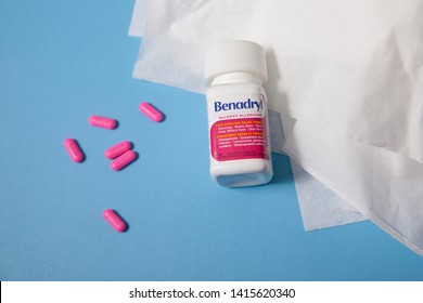 Halifax, Canada- June 1, 2019: The Antihistamine Benadryl With A Few Pink Pills And Some Tissues For Runny Nose 