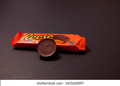 Halifax, Canada- May 31, 2019: Package Of Reese's Peanut Butter Cups With One Cup Out 