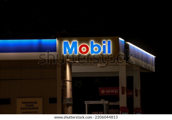 HALIFAX, NOVA SCOTIA, CANADA - AUG 2022 -\
MOBIL Gas Station store front at night. An American oil company is\
one of the leading brands in Atlantic\
Canada