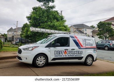 HALIFAX, NOVA SCOTIA, CANADA - JUNE 2022 - Best Burners service van parked in front of a house. Best Burners provides professional heating and oil burner solutions, products and services. 