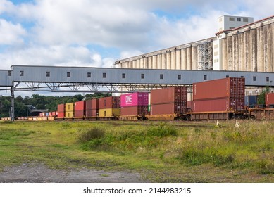 Halifax, Nova-Scotia, Canada – 4 september 2021 : Grain elevator and container train in the harbor of Halifax.