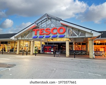 HALIFAX, UK - MAY 14, 2021:  A Tesco supermarket exterior in the early morning before the shoppers arrive. A British multinational groceries retailer