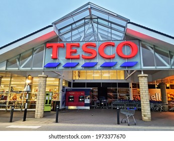 HALIFAX, UK - MAY 14, 2021:  A Tesco supermarket exterior in the early morning before the shoppers arrive. A British multinational groceries retailer