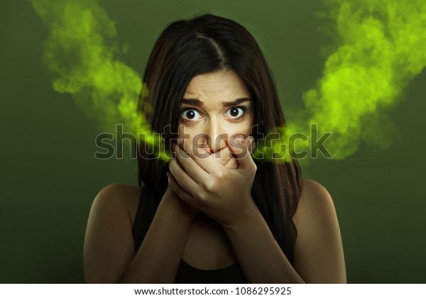 Halitosis concept of\
woman with bad breath