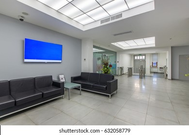 Hall Of The Office Center With Turnstiles
