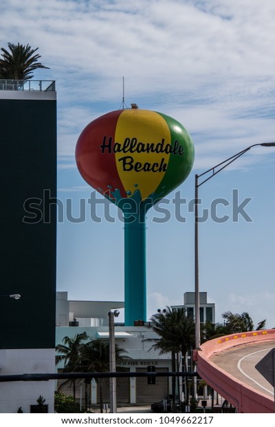 Hallandale\
Beach, Florida - January 12, 2018: Beautiful colorful water tower\
in Hallandale Beach, Florida on this\
date.