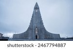 Hallgrimskirkja, with its towering spire, dominates the Reykjavik skyline. Its modernist design and panoramic views from the top make it a must-visit landmark in Iceland