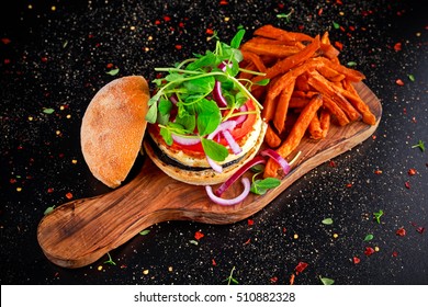 Halloumi cheese, mushroom Burger with sweet potatoes fries. concept of health food - Powered by Shutterstock