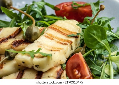 Halloumi Cheese Salad With Arugula And Tomatoes. Ketogenic Paleo Diet. Delicious Breakfast Or Snack, Clean Eating, Dieting, Vegan Food Concept. Top View.