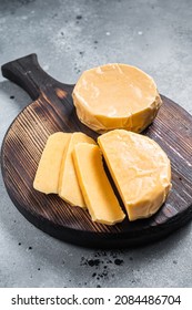 Halloumi Sliced Cheese On Kitchen Table. Gray Background. Top View