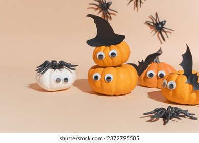 Halloween banner, cute pumpkins with googly eyes. Witch hat. Set orange pumpkin monsters and crawling spiders. Copy space, , art activity for kids, diy master class.