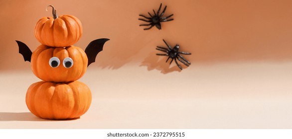 Halloween banner. Decoration for Halloween party - cute pumpkins with eyes and funny faces. Set pumpkin monsters and crawling spiders. Copy space, art activity for kids, diy master class, promotion - Powered by Shutterstock