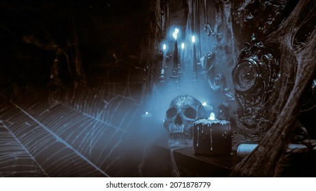Halloween. Black-and-white  spooky photo of black magic objects in a dark ancient castle. Haunted castle.